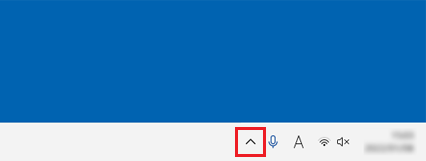 タスクバーの端にある三角をクリック